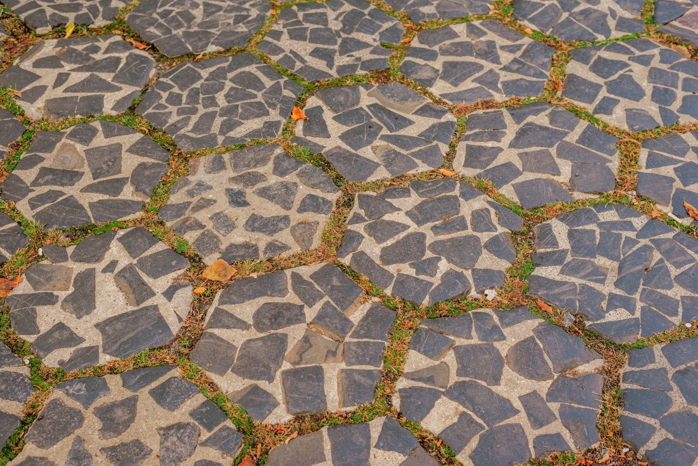 Crazy paving mosaic courtyard with living grass joints